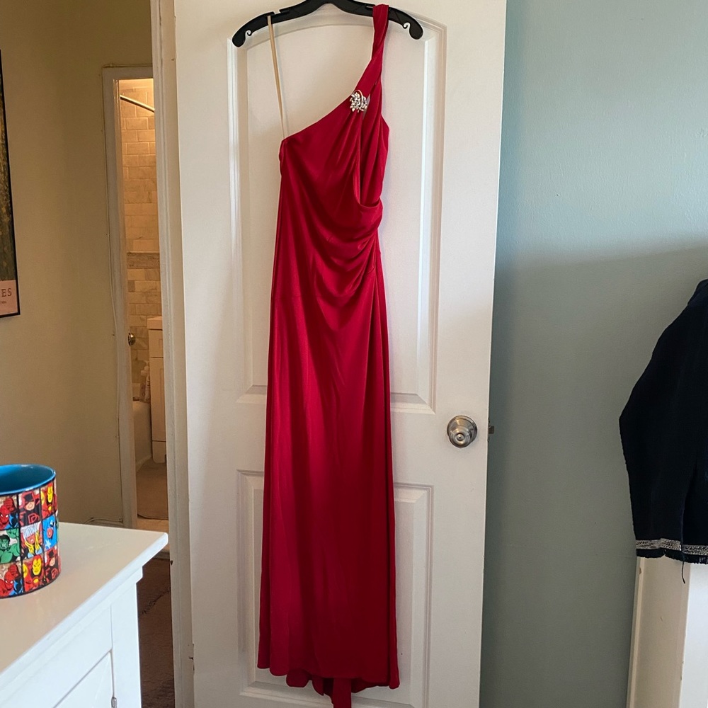 BCBG Maxazaria jewel toned red floor-length gown, one shoulder w crystal broach.
